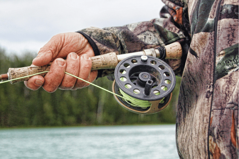 Close up of fishermans reel and rod