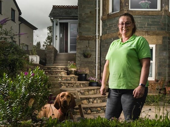 Catherine and her dog outside Appletrees