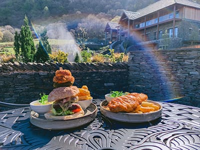 The Mighty Burger and the Local Cider Battered Fish & Chips, two of the most popular dishes available on the Lodore Falls Hotel & Spa outdoor dining menus