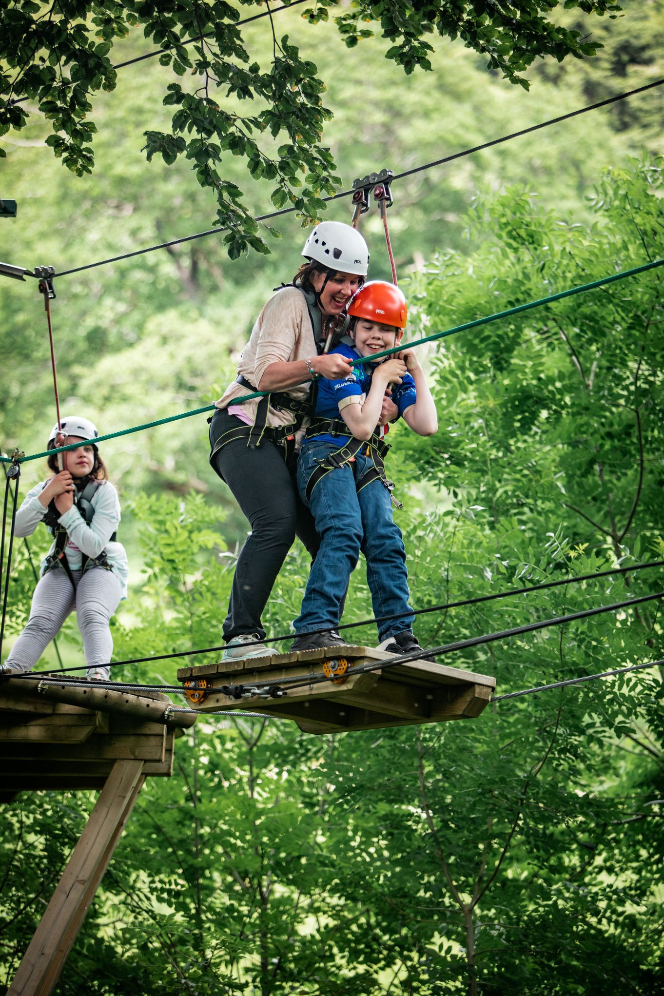 Oliver Voysey supported by mum Sarah and watched over by sister Elizabeth, aces the Calvert Lakes high ropes course