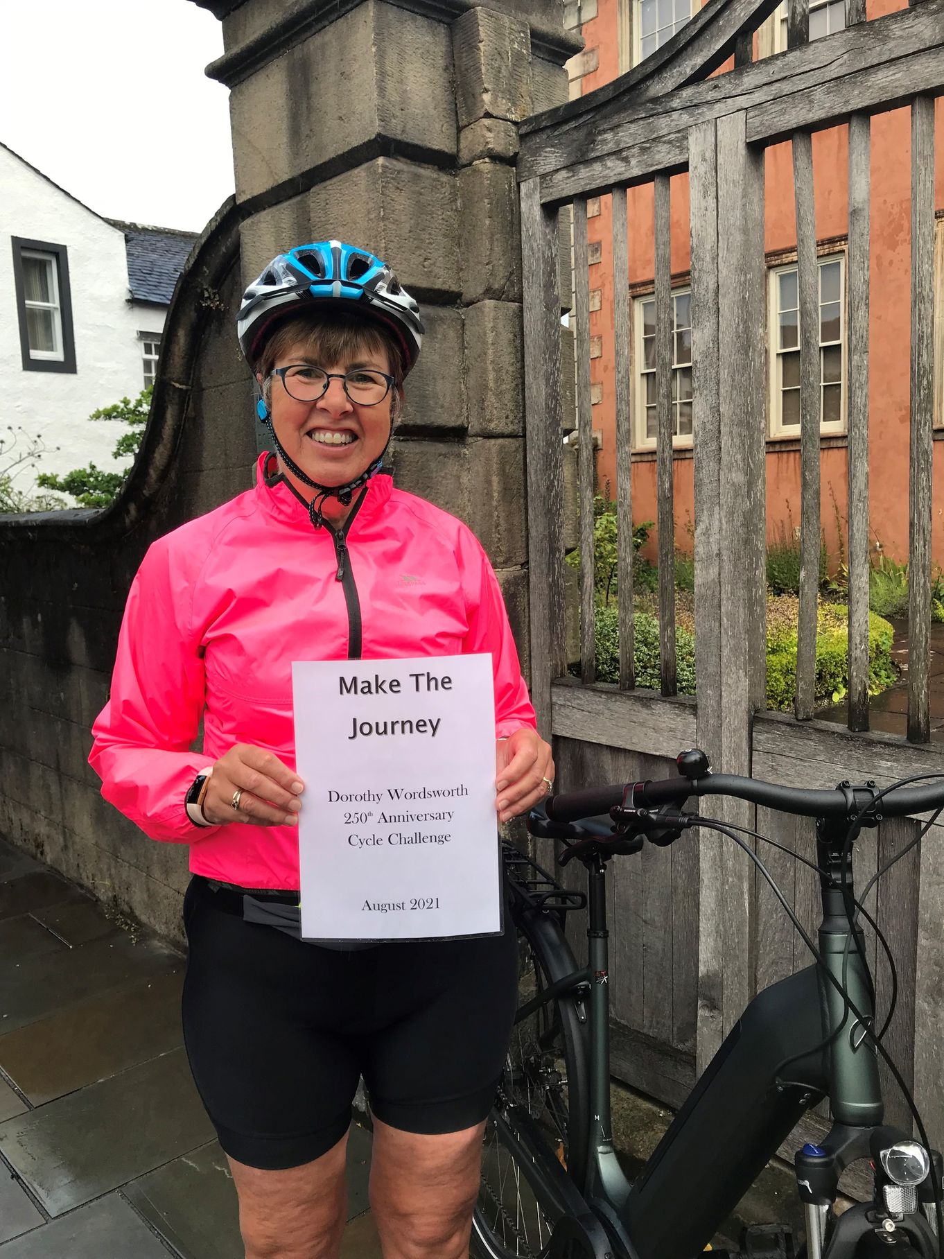 Gill Conlon starting her Make the Journey challenge for Dorothy Wordsworth's 250th anniversary outside Wordsworth House and Garden, Cockermouth