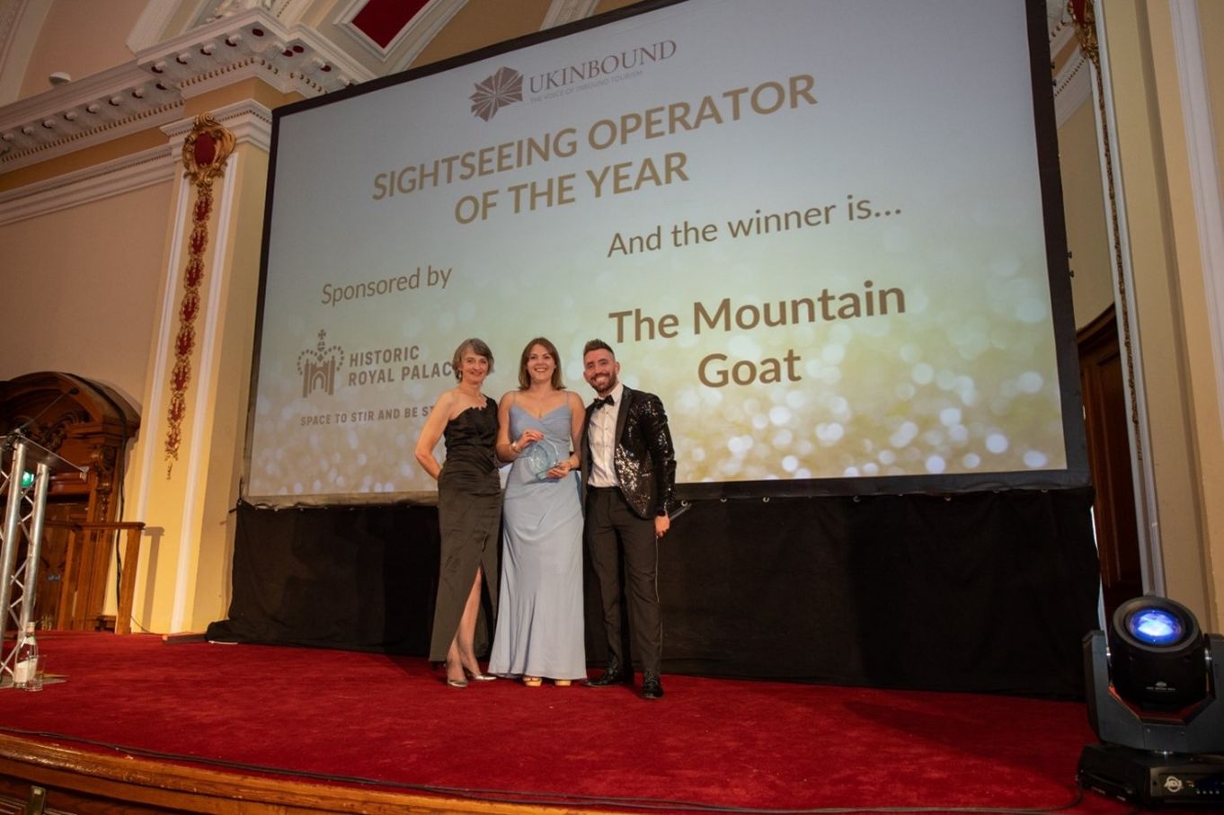 Mountain Goat Group Sales and Marketing Manager, Asia Connor (C), receiving the award.